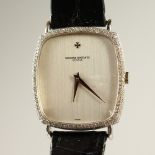 A GENTLEMEN'S 18CT WHITE GOLD AND DIAMOND VACHERON CONSTANTIN WRISTWATCH with leather strap.