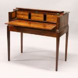 A 19TH CENTURY AND LATER MAHOGANY DESK, with rising top, fitted interior, on a later stand with