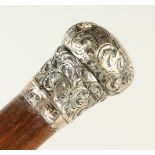 A SILVER HANDLE CANE with English silver handle. London 1908. 88cms long.