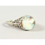 AN UNUSUAL 18K WHITE GOLD AND OPAL RING.
