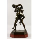A BRONZE GROUP "Heracles Wrestling Antaeus" on a marble base. 50cms high.