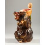 A MAJOLICA STYLE JUG, modelled as a bear. 29cms high.