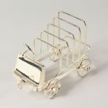 A VINTAGE PLATED CAR FOUR-DIVISION TOAST RACK. 16cms long.