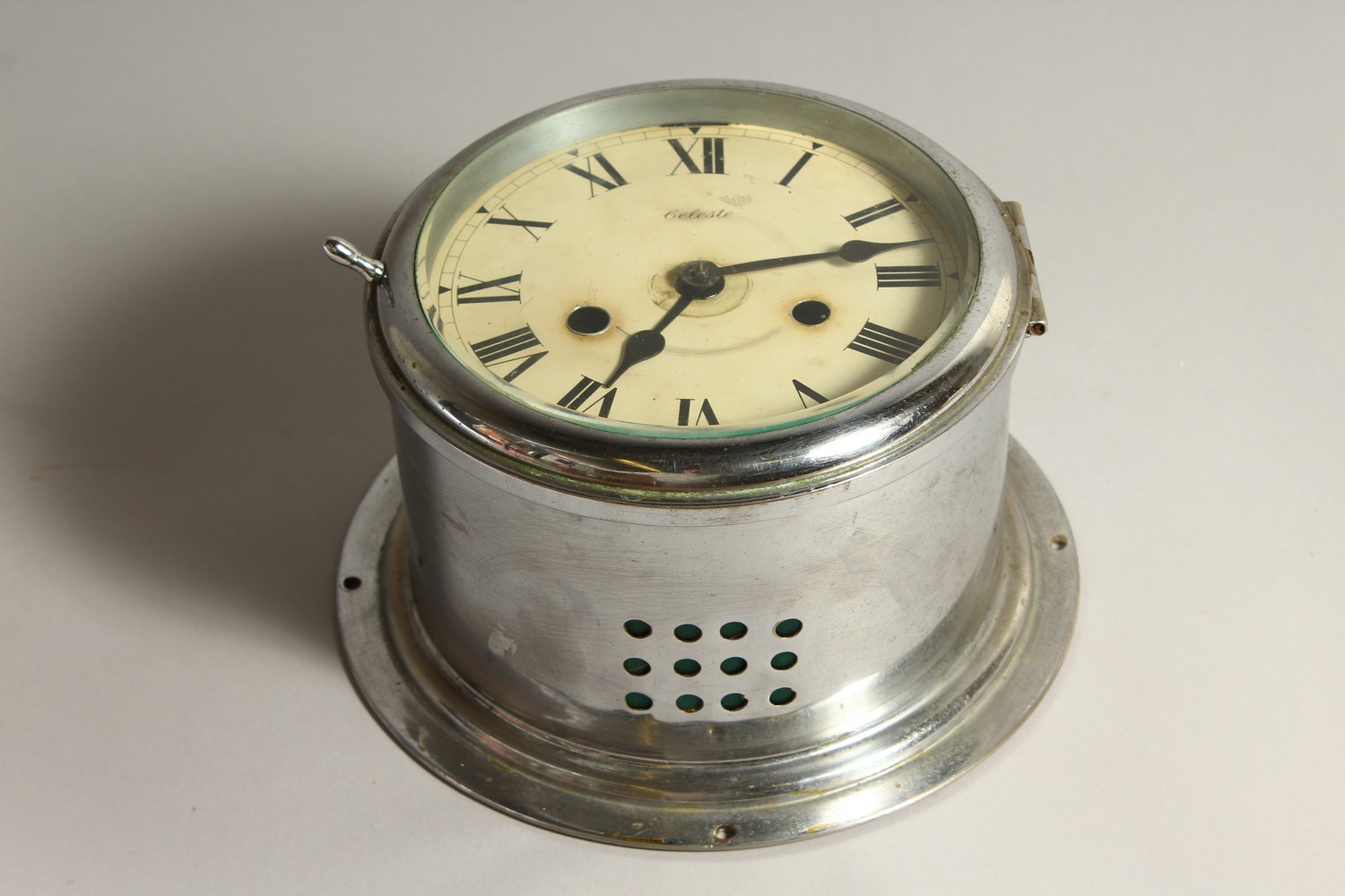 AN EARLY 20TH CENTURY NICKEL PLATED CIRCULAR WALL CLOCK, chiming on the hour, cream enamel dial with - Image 2 of 8