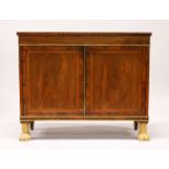 A REGENCY ROSEWOOD TWO DOOR SIDE CABINET, with tulipwood crossbanded top, plain frieze,