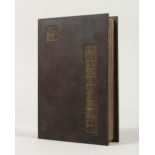 AN UNUSUAL CHINESE BOOK, inset with hardstone panels. 22.5cms high.