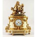 A SUPERB 18TH CENTURY FRENCH ORMOLU AND MARBLE MANTLE CLOCK, the top with three cupids after