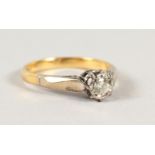 AN 18CT GOLD SOLITAIRE DIAMOND RING.