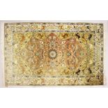 A GOOD PERSIAN CARPET, with rust ground floral panel within a beige ground border depicting