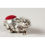 A NOVELTY SILVER RABBIT PIN CUSHION.