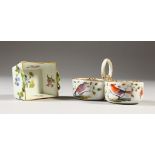 A SMALL MEISSEN DOUBLE SALT, painted with birds and a SMALL BASKET painted with flowers. Cross