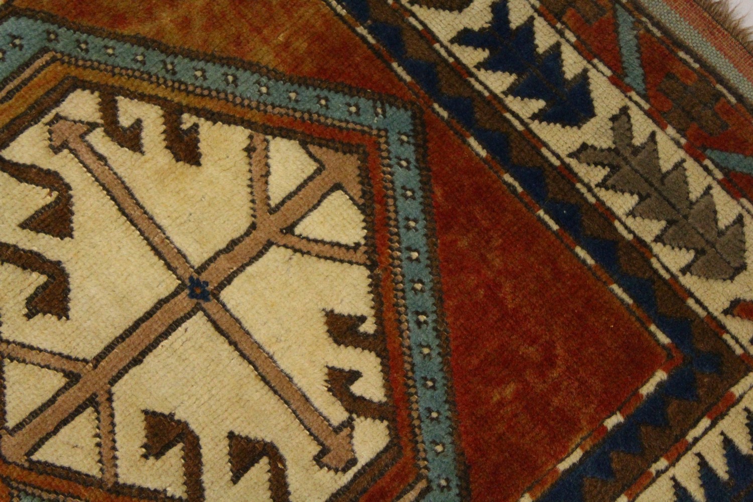 A SMALL PERSIAN RUG, the centre with two large geometric motifs, in a border with stylised tree - Image 3 of 8