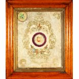 A VICTORIAN VALENTINE CARD in a maplewood frame. 24cms x 19cms.