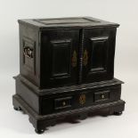 AN 18TH CENTURY ITALIAN TABLE CABINET with double panel doors opening to reveal eight small