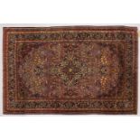A GOOD PERSIAN RUG, with allover floral decoration. 200cms x 125cms.