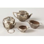 A THREE PIECE SILVER MINIATURE TEA SET.