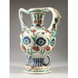 AN IZNIK TWO HANDLED POTTERY VASE. 35cms high.