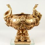 A LARGE AND IMPRESSIVE GILT BRONZE CENTRPIECE, the handles formed as classical female figures, on