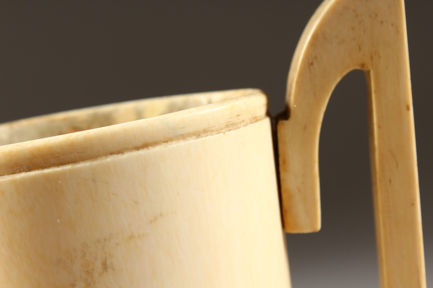 AN IVORY TWO HANDLED TUSK VASE. 7ins high. - Image 3 of 6