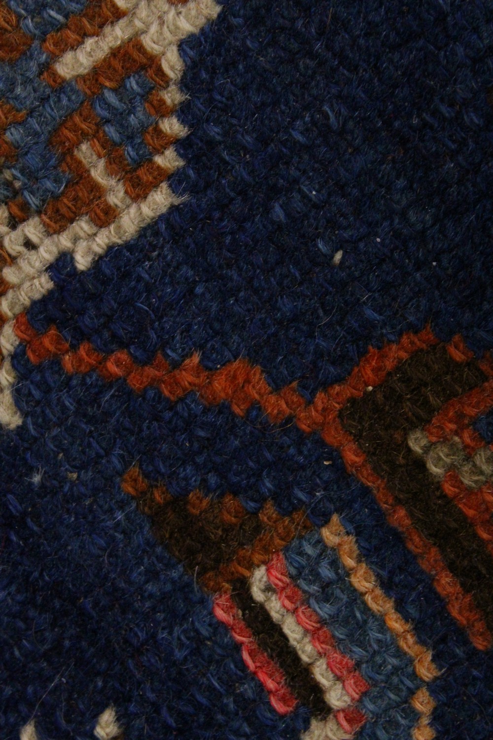 A PERSIAN RUG, blue ground with stylized motifs in a conforming border. 218cms x 130cms. - Image 7 of 9