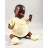 ARMAND MARSEILLE. A BLACK BABY DOLL with clothes. Stamped AM Germany 351/3K.