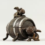 A SMALL VIENNA STYLE EROTIC BRONZE modelled as cherubs spying into a barrel. 9cms long.