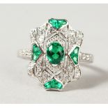 A SILVER GREEN PASTE DECO STYLE RING.