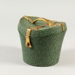 A SHAGREEN HAT BOX, with brass mounts. 14cms high.