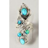 A SILVER AND REAL OPAL RING.