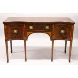 A GEORGE III STYLE MAHOGANY AND INLAID SERPENTINE FRONT SIDEBOARD, with a central drawer flanked