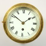 A LATE 19TH CENTURY BRASS CIRCULAR WALL CLOCK, with fusee movement, white enamel dial and Roman