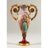 A RUSSIAN SILVER GILT AND ENAMEL DECORATED TWIN HANDLED PEDESTAL VASE, decorated with a young lady