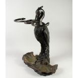 A GOOD 19TH CENTURY CAST IRON STICK STAND, POSSIBLY COALBROOKEDALE, "Heron and the Serpent" model,