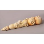 A GOOD JAPANESE MEIJI PERIOD CARVED AND STAINED IVORY OKIMONO - FRUIT & RATS, the okimono carved