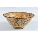 A 13TH CENTURY PERSIAN SELJUK KASHAN LUSTRE WARE POTTERY BOWL, 21cm diameter, 9cm high.