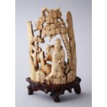 A CHINESE 17 TH CENTURY LATE MING CARVED IVORY FRAGMENT, depicting a scholar under a pine tree