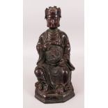 A GOOD CHINESE 19TH / 20TH CENTURY BRONZE FIGURE OF A SEATED EMPEROR, the bronze modeled seated with