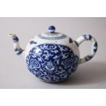 A CHINESE KANGXI BLUE & WHITE WINE POT AND COVER, decorated with formal scroll and vine