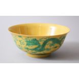 A CHINESE YELLOW GROUND KANGXI STYLE DRAGON BOWL, the exterior with two dragons amongst stylized