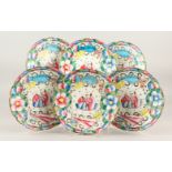 SIX 19TH CENTURY CHINESE CHINOISERE PORCELAIN PLATES, decorated with scenes of figures and flora,