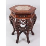 A SMALL 19TH CENTURY CHINESE HEXAGONAL FORM MARBLE TOP HARDWOOD TABLE / PLANTER, the top inset