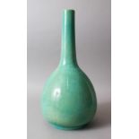 A LATE 19TH CENTURY CHINESE TURQUOISE GROUND PORCELAIN BOTTLE VASE, the base bearing an incised