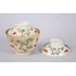 A LATE 19TH CENTURY CHINESE GUANGXU PERIOD FAMILLE ROSE TEA CUP AND TWO COVERS, the decoration of