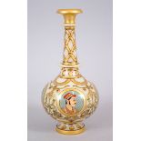 AN INDIAN GILDED GLASS WATER BOTTLE painted with four circular portraits, 25cm high.