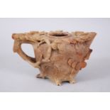 A GOOD CHINESE CARVED SOAPSTONE TEAPOT, with carved decoration of pine trees, 9cm high x 16cm wide.