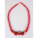 A HEAVY RED CORAL NECKLACE.