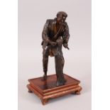 A GOOD JAPANESE MEIJI PERIOD BRONZE & MIXED METAL WOOD WORKER BY MIYAO EISUKE, the bronze okimono