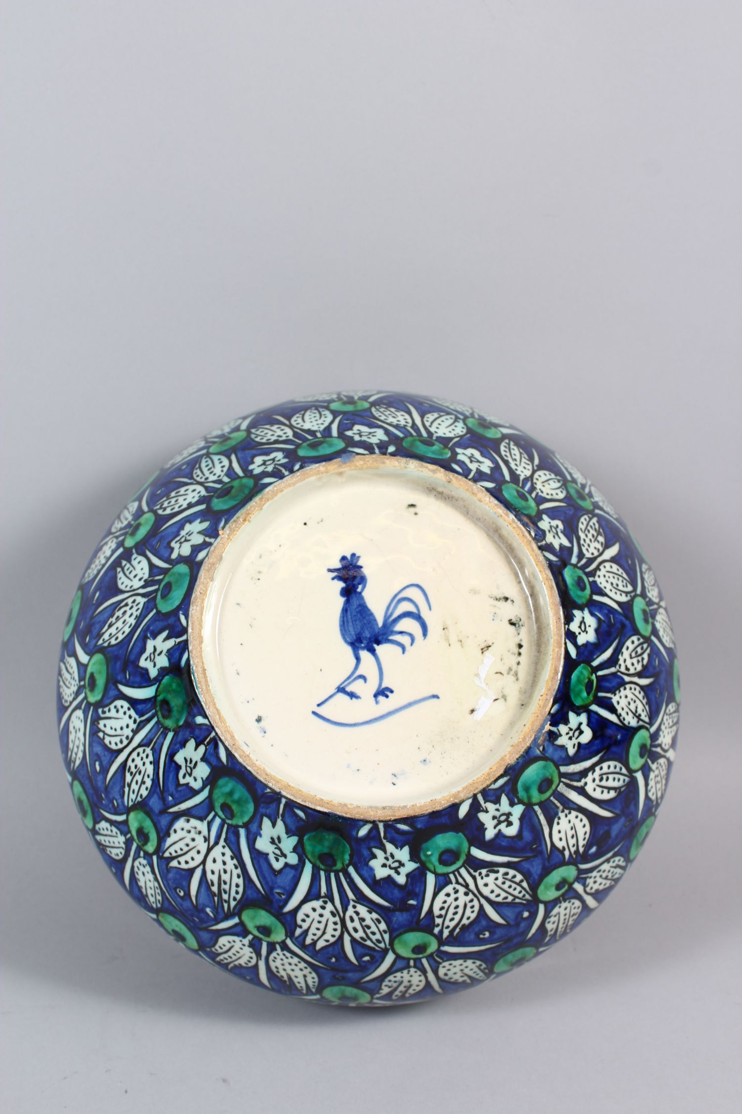 A 19TH CENTURY IZNIK STYLE POTTERY CIRCULAR BOWL, the sides with blue ground and flower heads, - Image 5 of 5