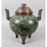 A LARGE 18TH / 19TH CENTURY CHINESE CLOISONNE TRIPOD CENSER & COVER, decorated with panels of