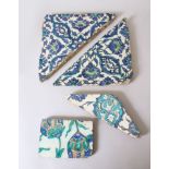 A COLLECTION OF FOUR 16TH-17TH CENTURY DAMASCUS IZNIK TILE PIECES.